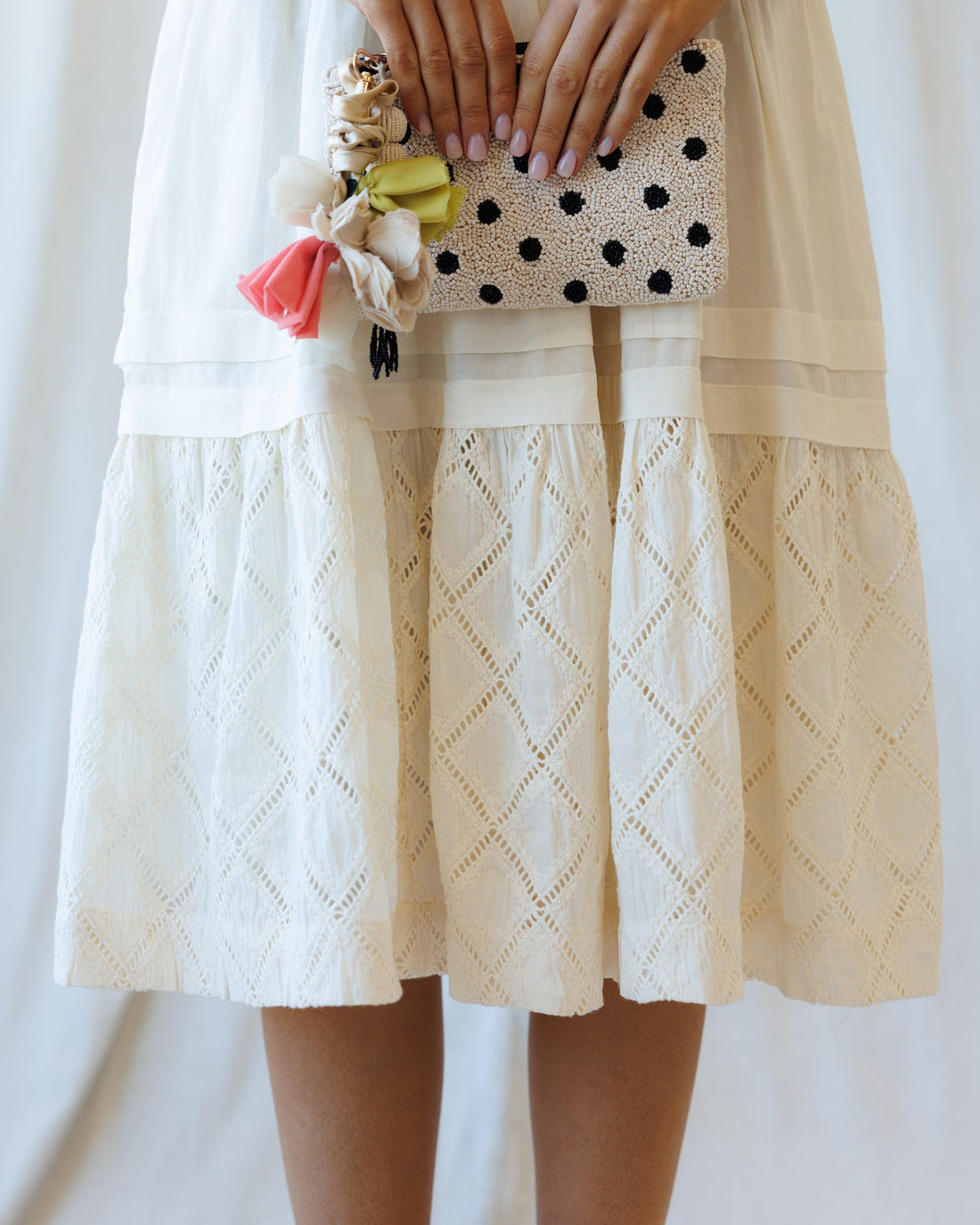 Downeast Icon Demi Lace Dress, elegant sleeveless dress with intricate lace details and a fitted silhouette.