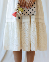 Downeast Icon Demi Lace Dress, elegant sleeveless dress with intricate lace details and a fitted silhouette.