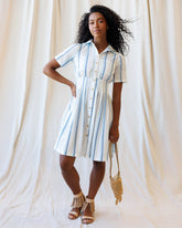 Downeast Seaside Stripe Dress featuring a breezy, casual design with blue and white horizontal stripes.