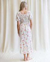 Downeast high tea dress with floral pattern, sleeveless design, and elegant fit perfect for spring or summer occasions.