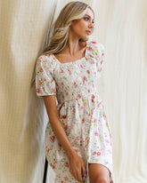 Downeast high tea dress featuring floral print, sleeveless design, and elegant A-line silhouette perfect for summer occasions.