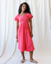 Downeast One Fine Day Dress displayed on a hanger, showcasing a lightweight, floral-patterned dress with short sleeves.