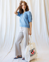 Downeast Portside Chambray Popover top with long sleeves and collar, featuring a relaxed fit and button front.