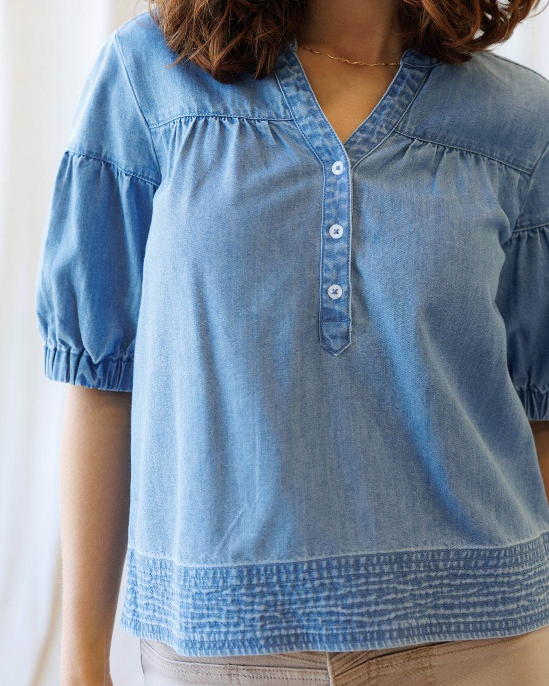 Downeast Portside Chambray Popover top with long sleeves and button details, casual and stylish for everyday wear.