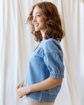 Downeast Portside Chambray Popover top featuring a relaxed fit, button-up front, and classic collar in lightweight chambray fabric.