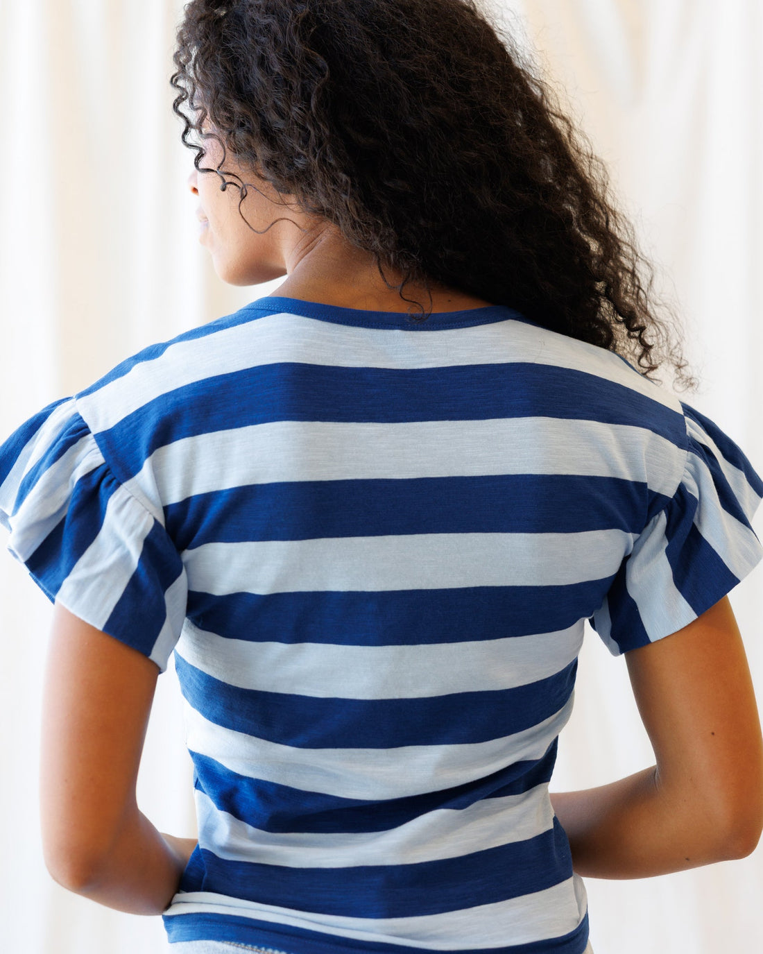 Downeast Charisma Tee in soft fabric, featuring a classic crew neck and short sleeves, displayed on a neutral background.
