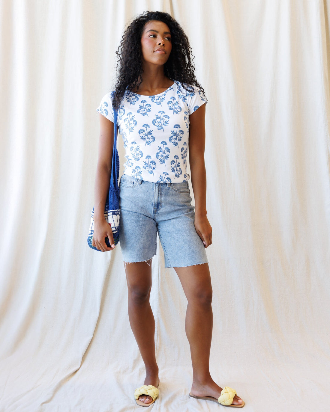 Downeast Artistic Tee, a stylish casual top with artistic print, shown in a close-up image.