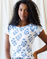 Downeast Artistic Tee tops featuring a colorful, artistic print on soft fabric, displayed on a neutral background.