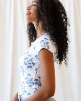 Downeast Artistic Tee top with colorful abstract design, casual fit, short sleeves, and round neckline.