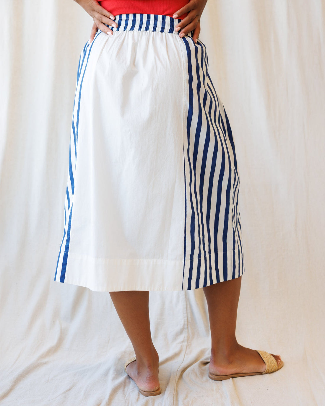 Downeast Sail Away skirt in lightweight fabric with a nautical stripe pattern, featuring a relaxed fit and side pockets.