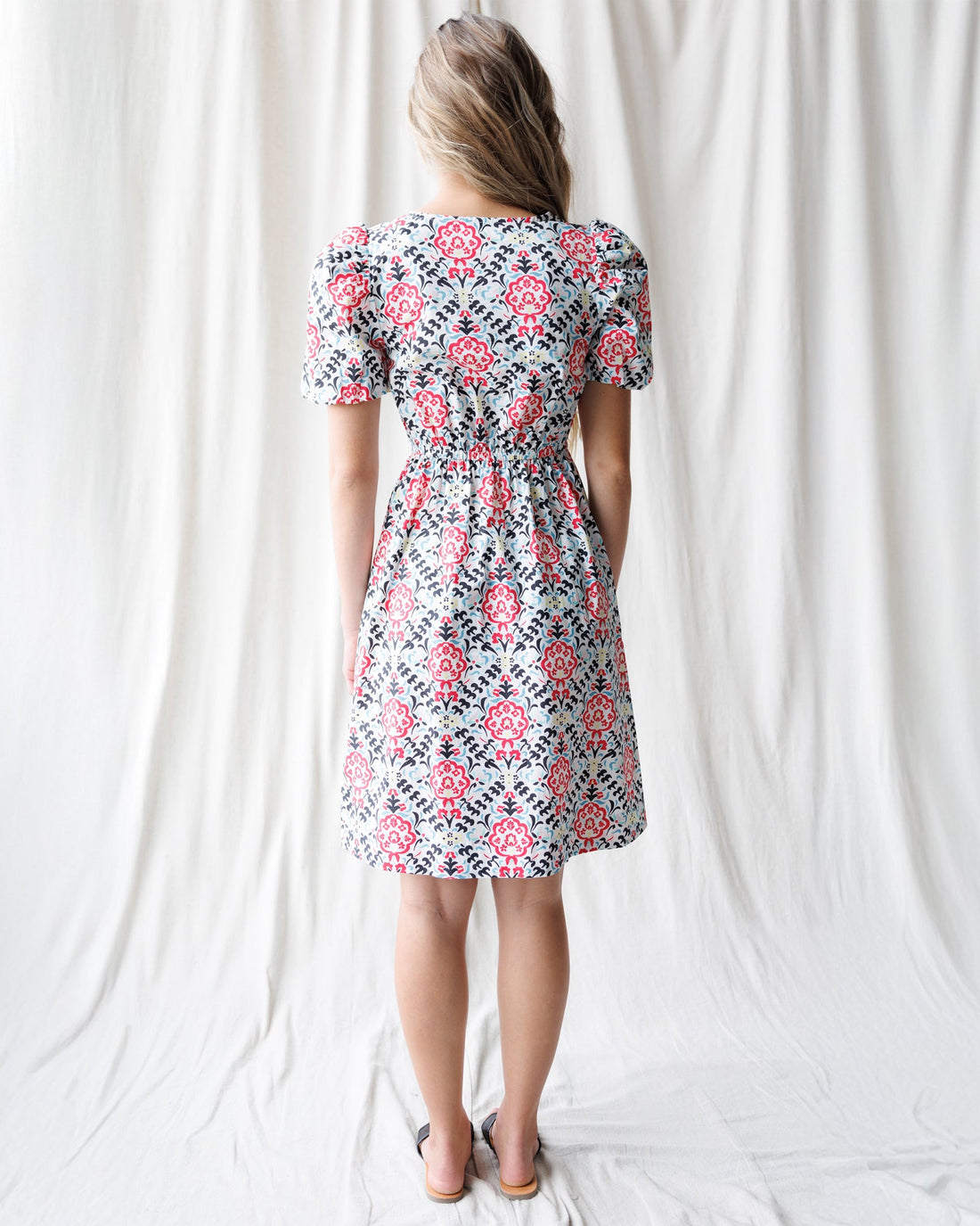Downeast Capri Dress in lightweight fabric with a relaxed fit, featuring a floral pattern and sleeveless design.