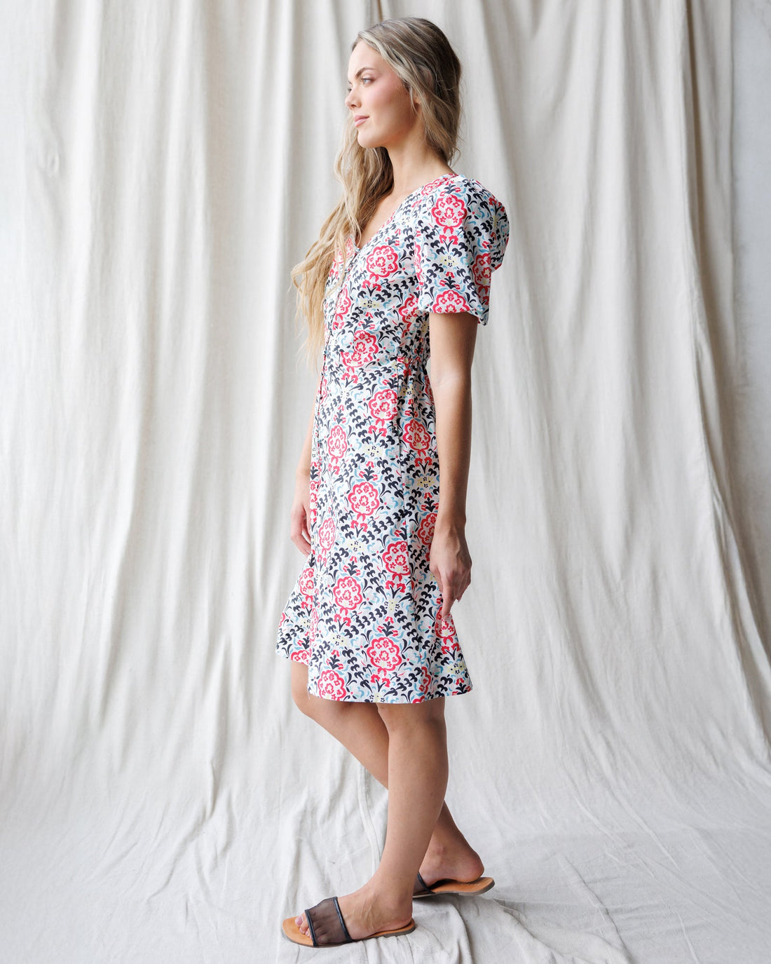 Downeast Capri dress with a sleeveless design, lightweight fabric, and floral pattern, perfect for summer wear.