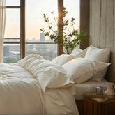 Luxury Australian sateen sheet set by Italic, showing smooth, soft bed sheets with a neatly made bed and plush pillows.
