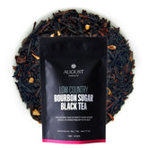 Black tea from August Uncommon Tea, Low Country Bourbon Sugar Black Tea, showcasing dry tea leaves with a rich, dark appearance.