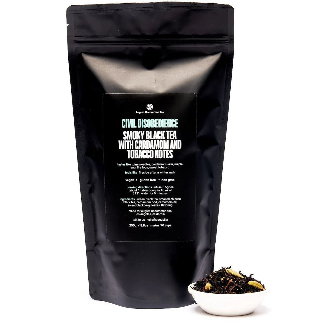 Civil Disobedience Smoky Cardamom Black Tea in a 70-cup bag by August Uncommon Tea, featuring dark tea leaves with hints of smoky and cardamom aroma.