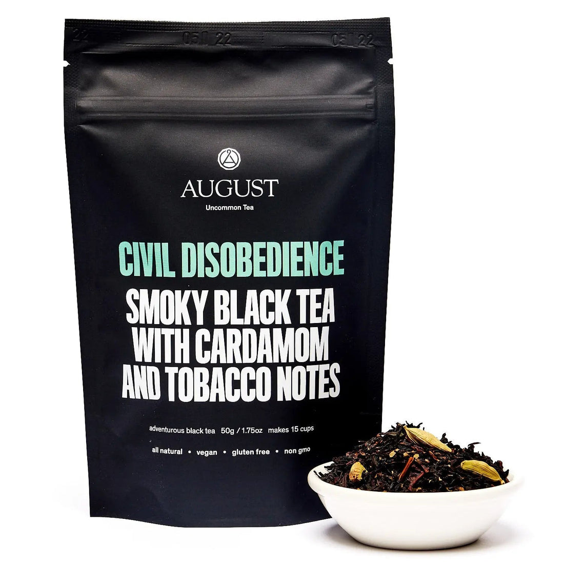 Civil Disobedience smoky cardamom black tea in a black tea bag from August Uncommon Tea, with a rich, aromatic appearance.
