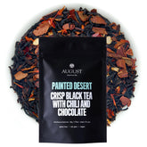 Painted Desert Chocolate Chili Black Tea by August Uncommon Tea, featuring dark brewed tea with rich chocolate and spicy chili notes.