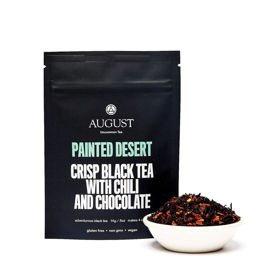Four cups of Painted Desert Chocolate Chili Black Tea by August Uncommon Tea, showcasing dark brewed black tea in glass cups.