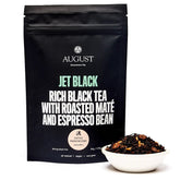 Jet Black Roasty Coffee Black Tea in a 15-cup bag by August Uncommon Tea, featuring dark, rich black tea leaves.