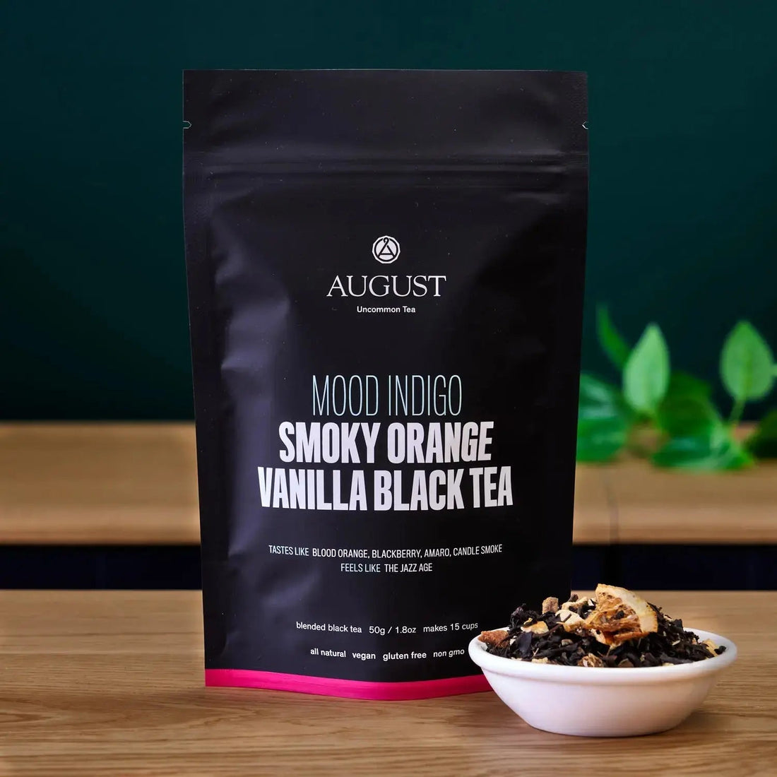 Smoky orange vanilla black tea from August Uncommon Tea in a 15-cup bag, showcasing the rich tea leaves and packaging.