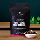 Smoky orange vanilla black tea from August Uncommon Tea in a 15-cup bag, showcasing the rich tea leaves and packaging.