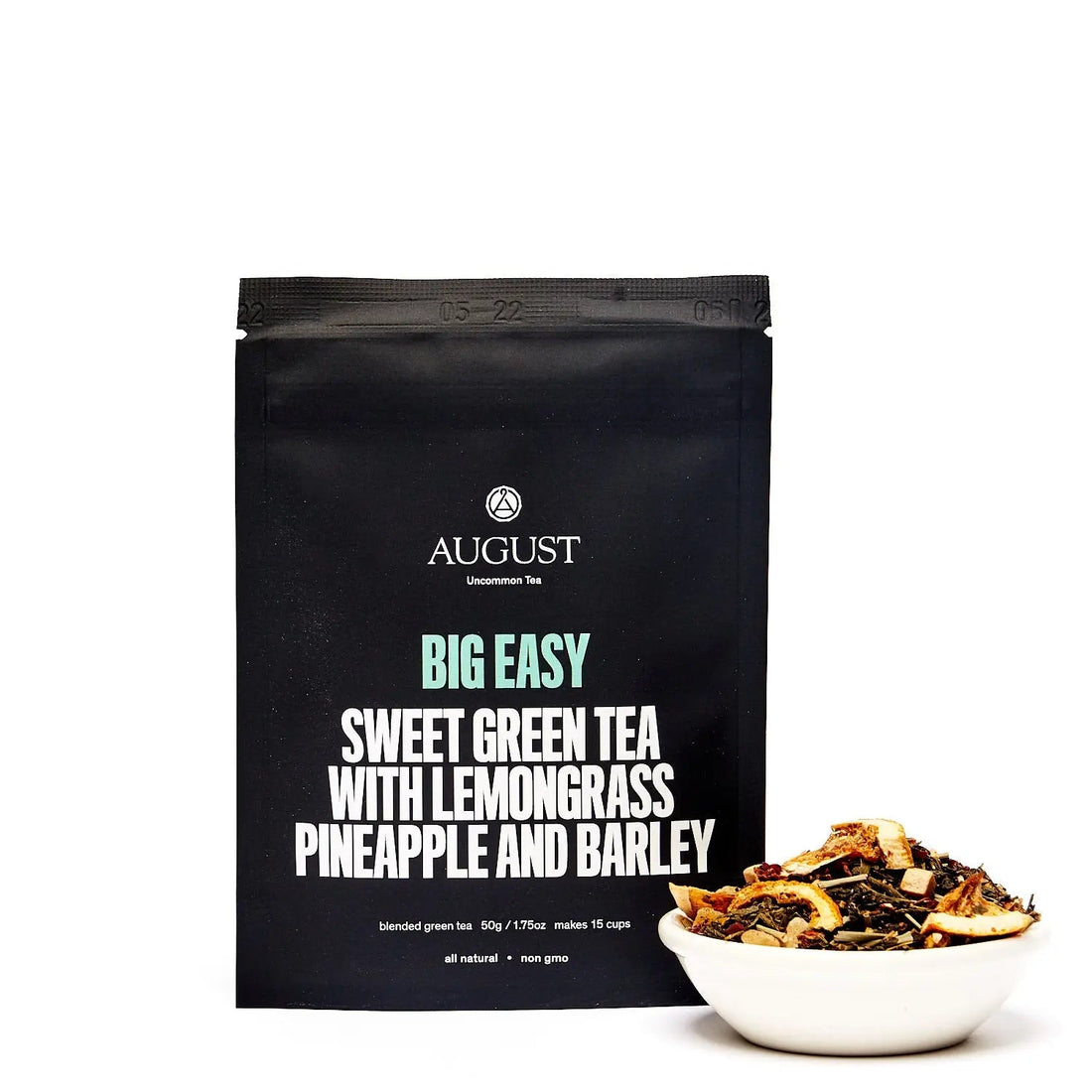 Four cups of Big Easy Pineapple Caramel Green Tea by August Uncommon Tea, showcasing vibrant green tea with pineapple and caramel flavors.