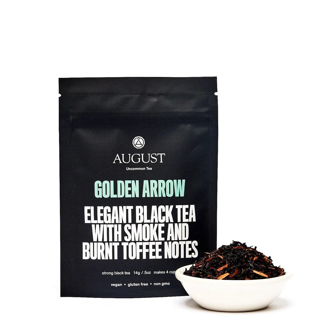 Golden Arrow Smoky Toffee Black Tea from August Uncommon Tea in a four-cup bag, showcasing rich black tea leaves.