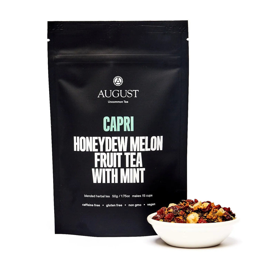 Herbal tea bag of August Uncommon Tea Capri Honeydew Melon Mint Tea, caffeine-free, in a 15-cup bag packaging.
