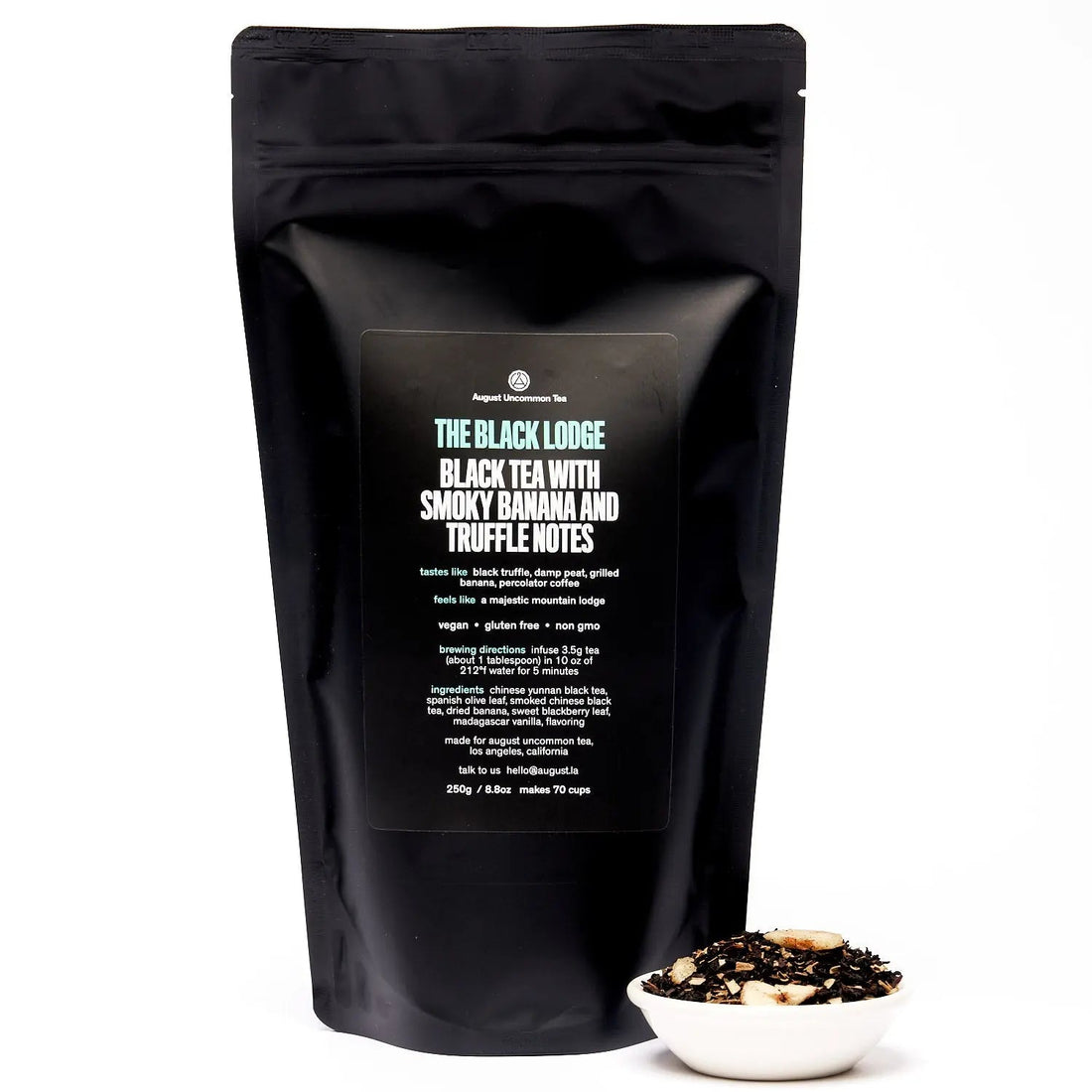 Smoky Banana Black Tea from August Uncommon Tea in a 70-cup bag, featuring dark black tea leaves with hints of banana flavor.