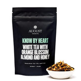White tea bag of Know by Heart Orange Blossom Almond White Tea by August Uncommon Tea, ready for brewing in a 15-cup bag.