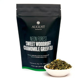 Bag of Neon Forest Apple Chamomile Green Tea by August Uncommon Tea, featuring colorful packaging for green tea lovers.