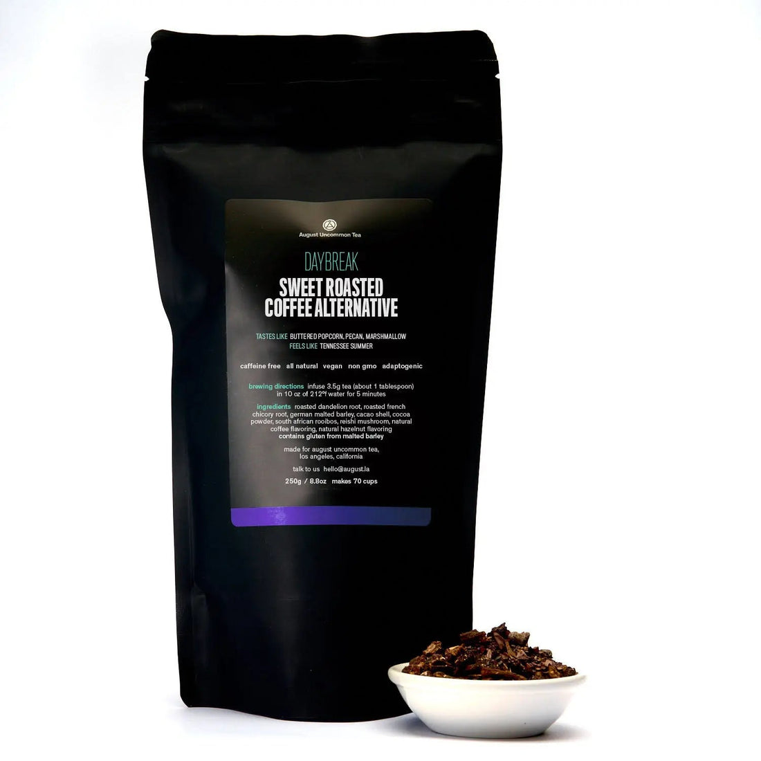 August Uncommon Tea Daybreak sweet roasted herbal coffee alternative in a cup, caffeine-free beverage with rich, warm tones.