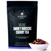 Mojave Smoky Hibiscus Cherry Tea by August Uncommon Tea in a 15-cup herbal tea bag, featuring vibrant hibiscus and cherry flavors.