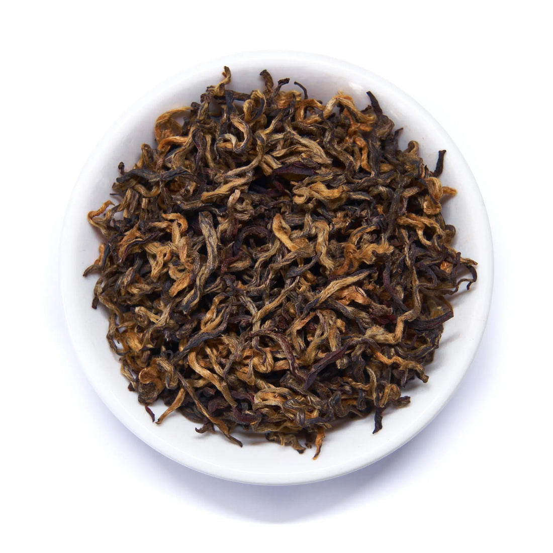 Single estate Nepalese black tea leaves from Rare Leaves Gold by August Uncommon Tea, showcasing rich, dark tea leaves.