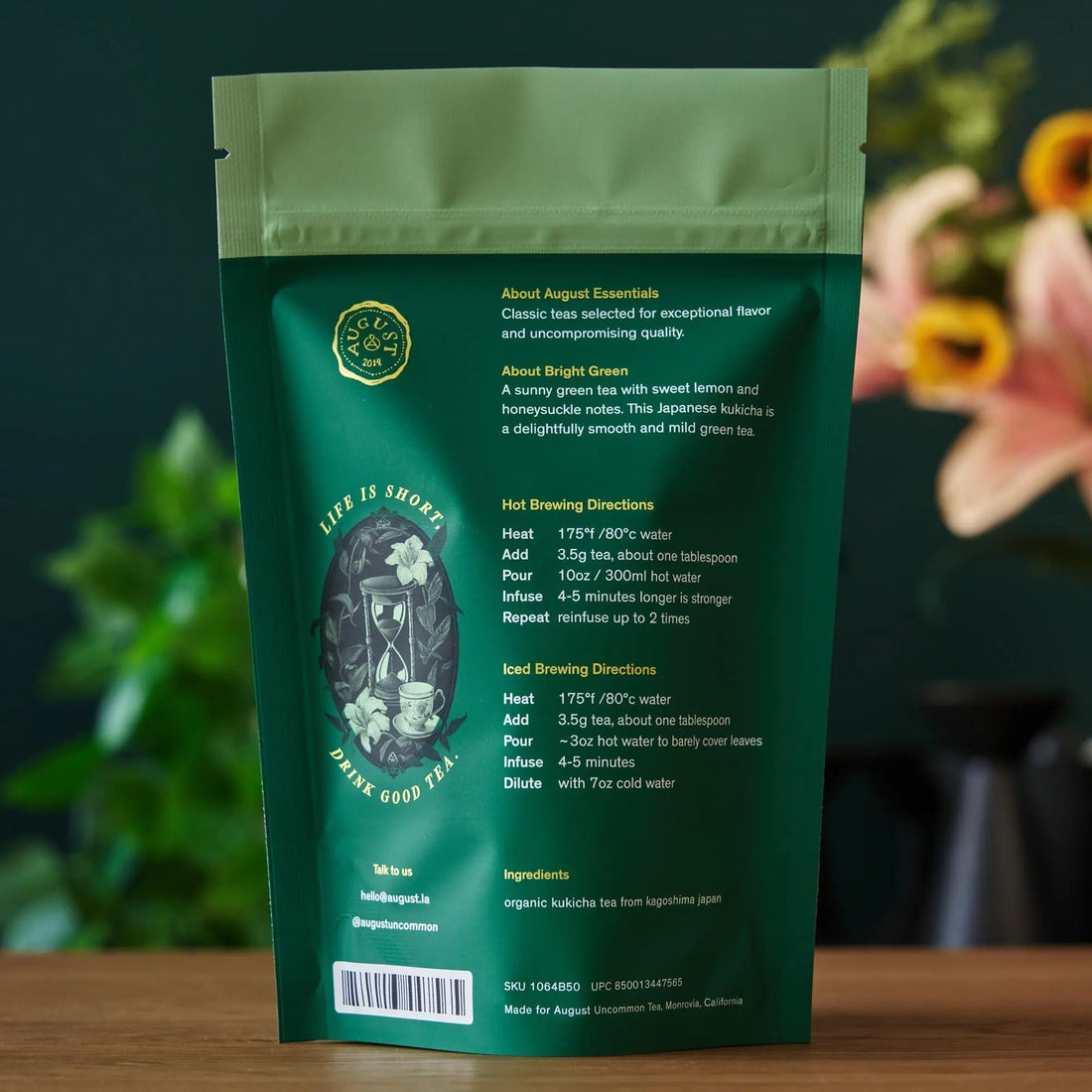 Bright green tea bag of August Uncommon Tea Essentials Bright Green Green Tea, ready for brewing in a 15-cup bag.