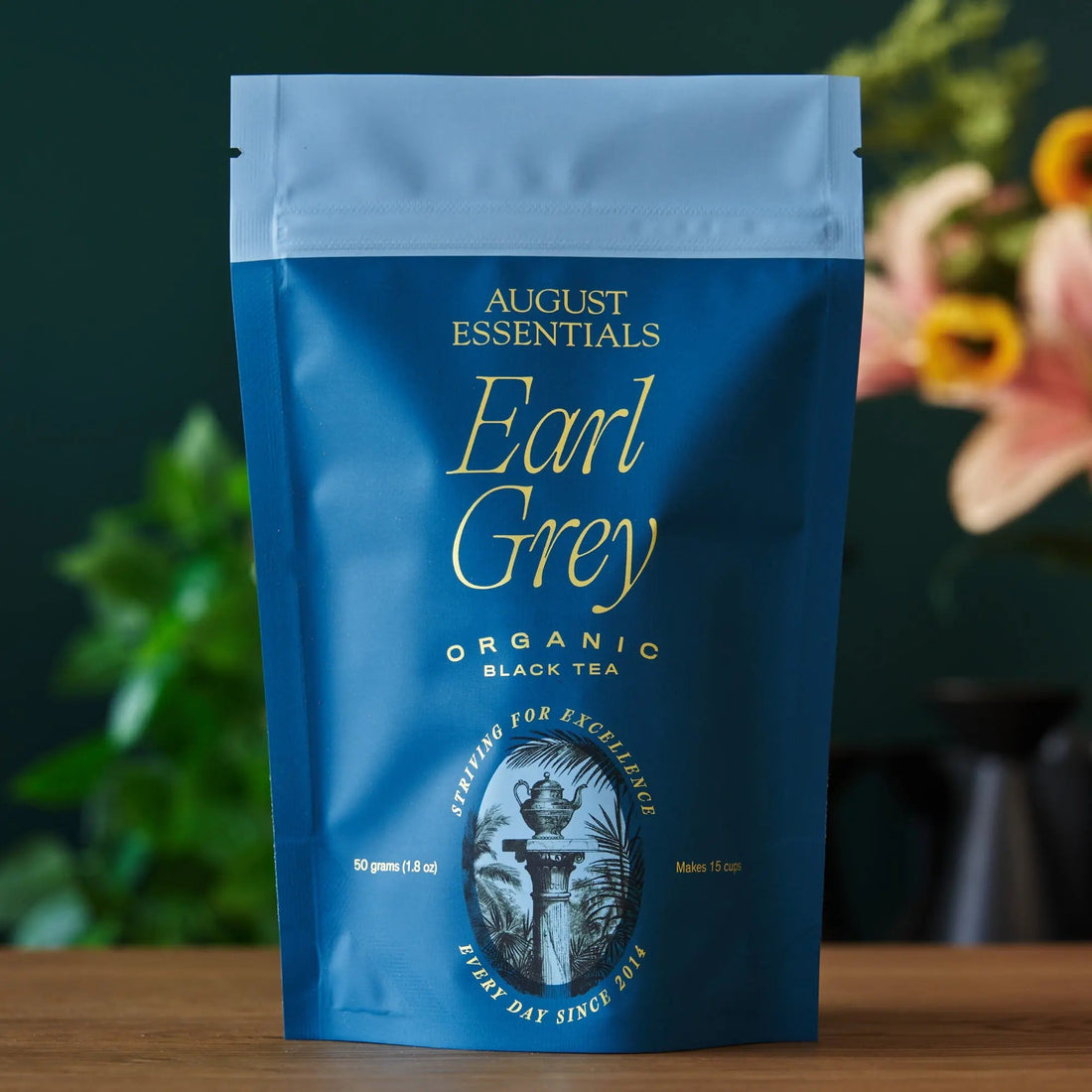Essentials Earl Grey black tea bag from August Uncommon Tea, shown in a 15-cup package, ready for brewing.