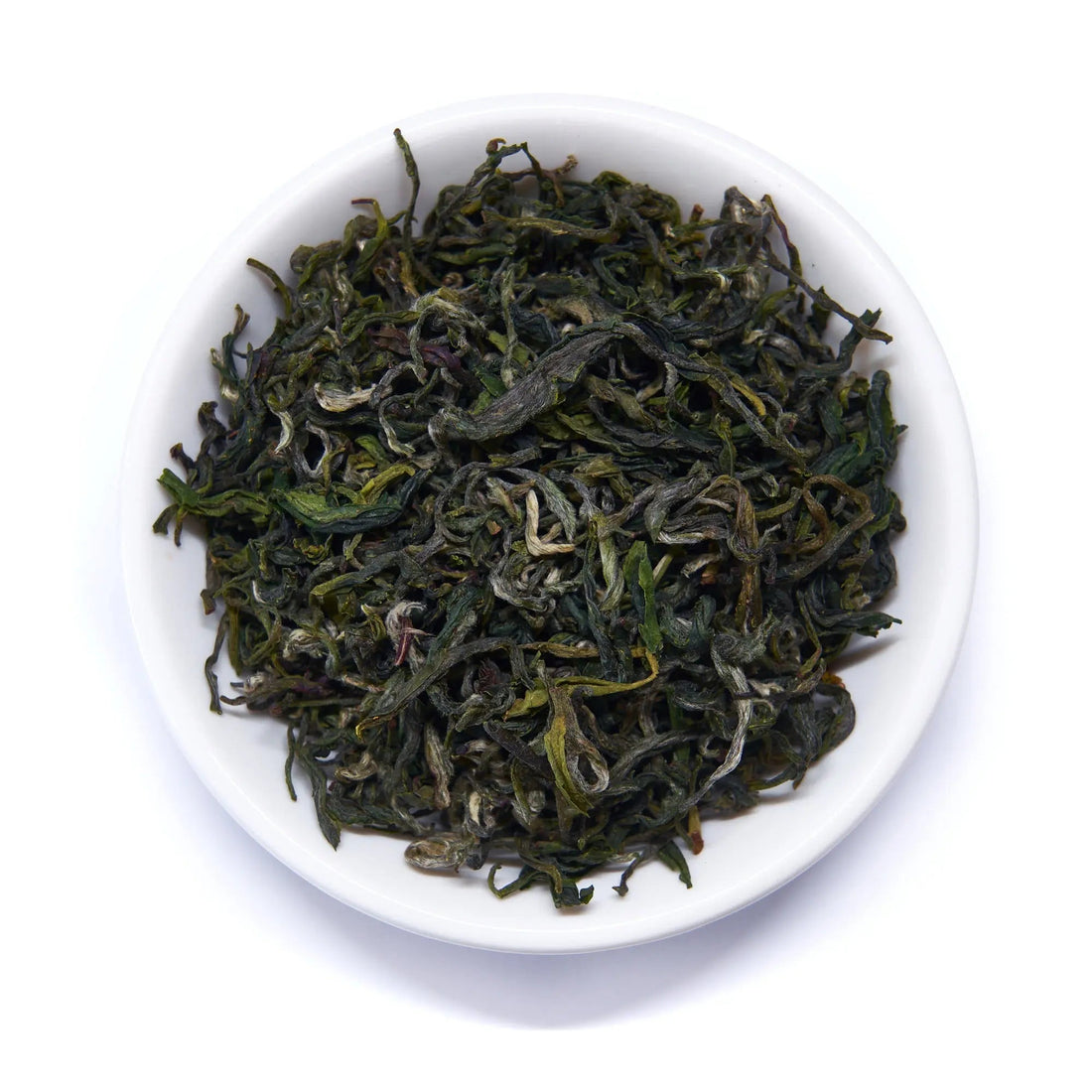 Single estate Pi Lo Chun green tea leaves from Rare Leaves Emerald by August Uncommon Tea, showcasing fresh, twisted green tea leaves.