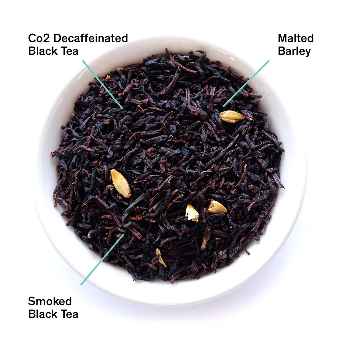 Decaf Low Country Bourbon Sugar Black Tea by August Uncommon Tea, showing a brewed black tea in a glass cup with tea leaves.