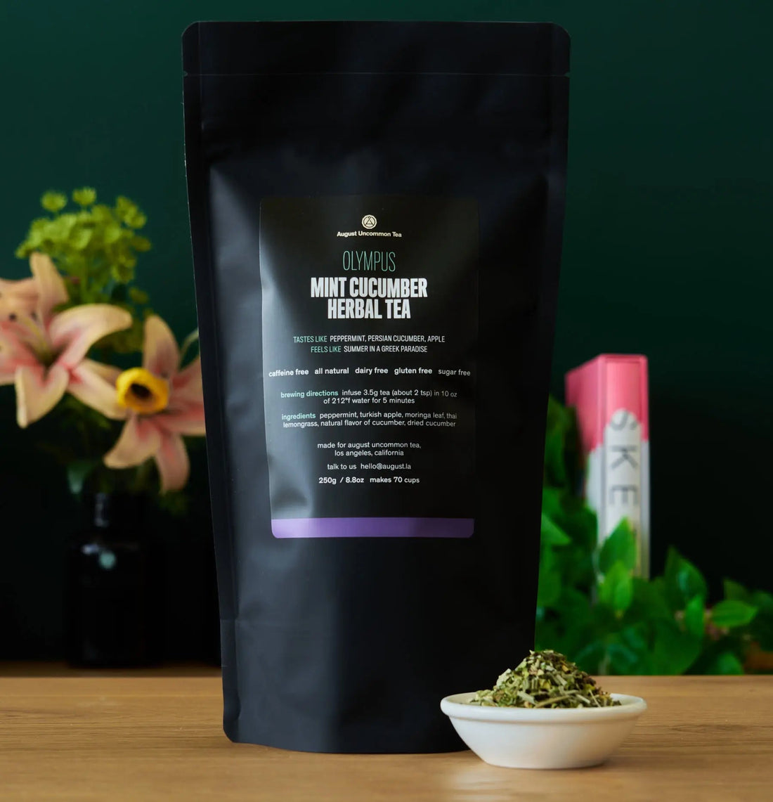 Olympus Mint Cucumber Herbal Tea by August Uncommon Tea, caffeine-free herbal tea in a 70-cup bag, fresh and vibrant.