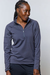 Goal Five Foudy mid-weight long sleeve training zip top, black ½ zip athletic top with logo detail, suitable for workout and active wear.