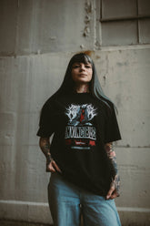 Black Neck Snap T-Shirt from Any Means Necessary Clothing, featuring snap button neckline and casual fit for streetwear style.
