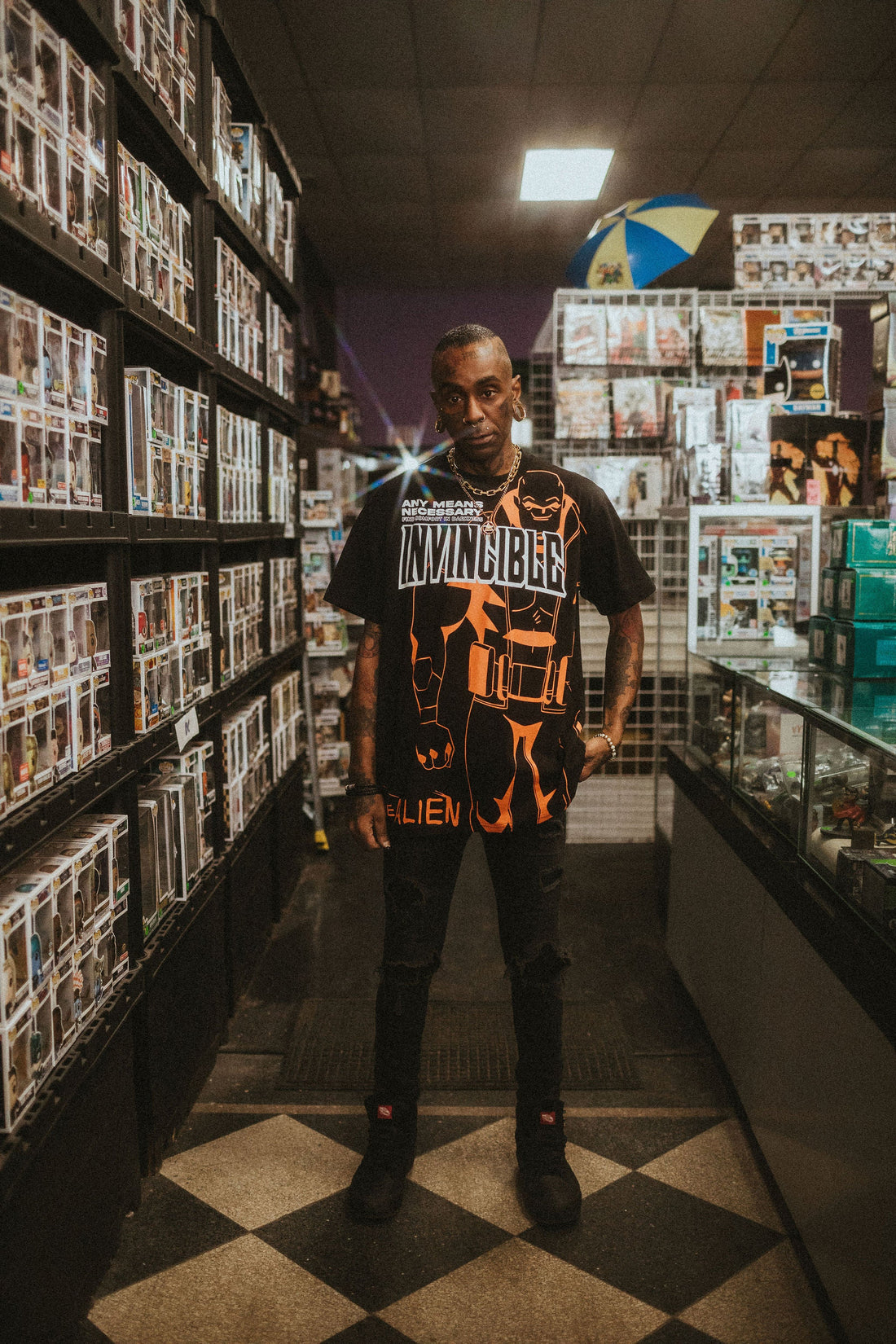 Allen Line Art Series T-Shirt from Any Means Necessary Clothing, featuring a detailed line art design on a casual shirt.
