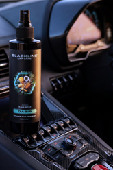 Blackline Car Care BLACKLINE® 8oz air freshener for cars, featuring a sleek design and fresh scent in a clear container.