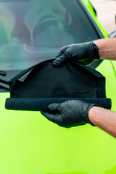 Blackline Car Care BLACKLINE synthetic clay towel shown, designed for detailing and smoothing vehicle paint surfaces.