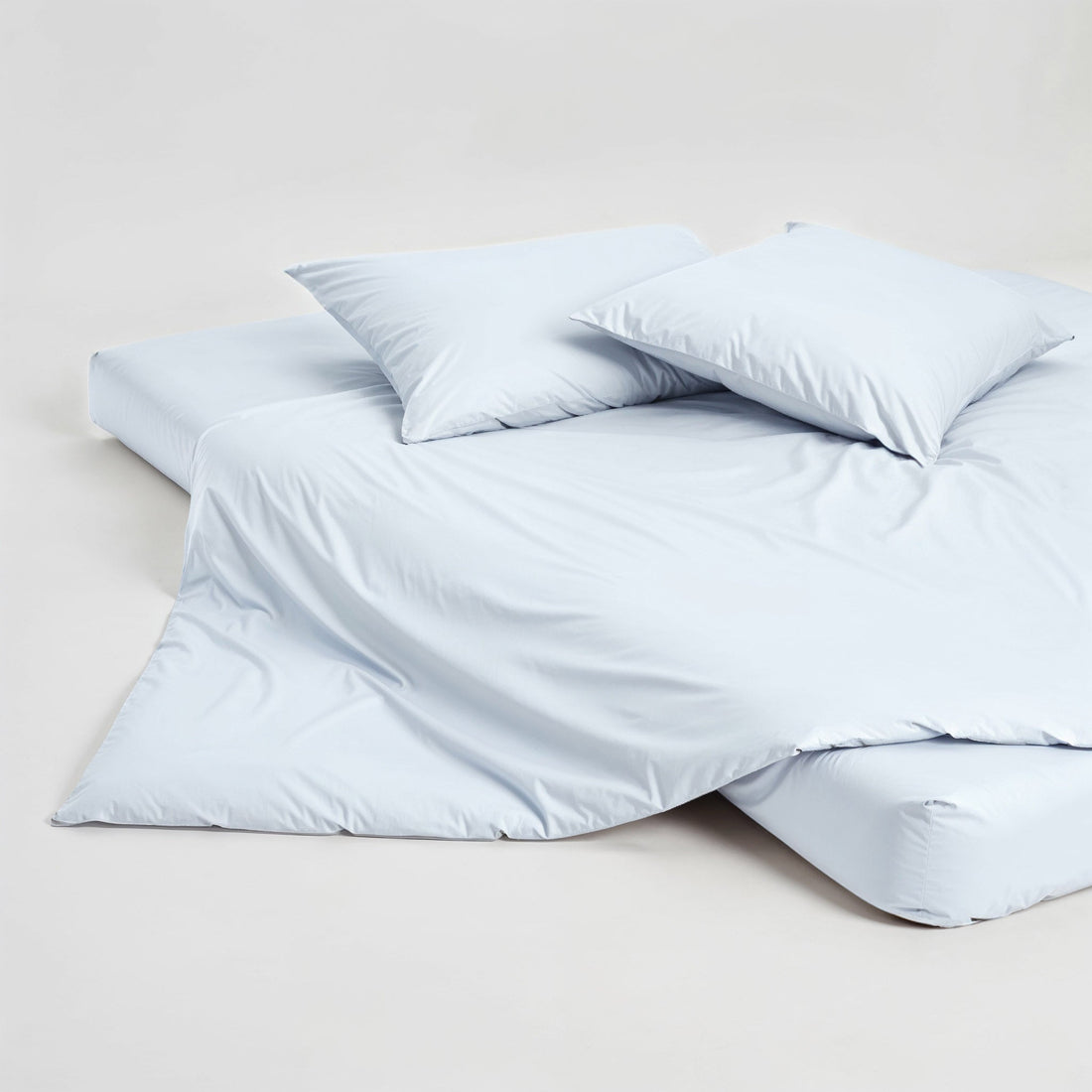 Italic Luxe Australian Sateen Pillowcase Set for bed, featuring smooth, soft satin fabric and elegant home bedroom decor.