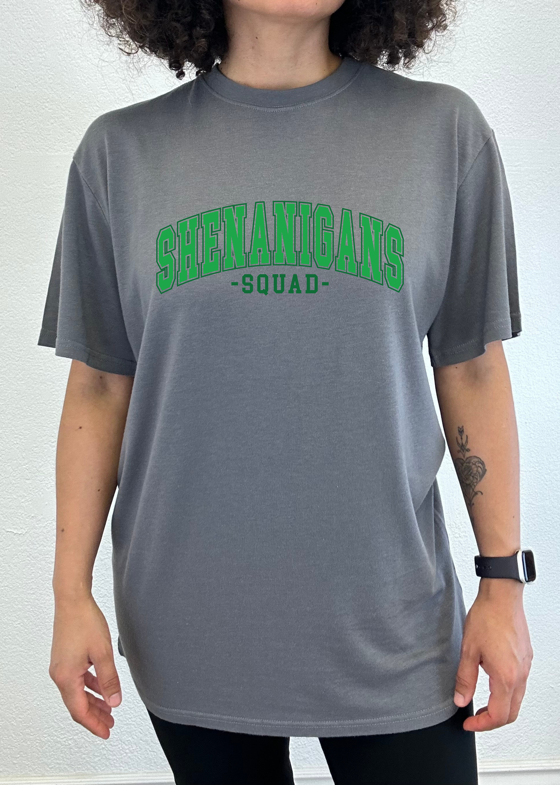 Unisex bamboo and cotton graphic T-shirt from Spun Bamboo featuring playful "Shenanigans Squad" print, casual men&