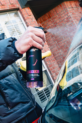 Blackline Car Care BLACKLINE® Crystal Glass Cleaner spray bottle with a blue trigger for sparkling clean car windows and glass surfaces.