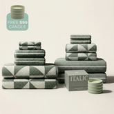 Italic Deia Australian Cotton Towels for home bedding, showcasing soft, plush white cotton with a subtle textured pattern.