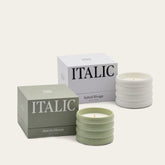 Set of two Italic soy wax ceramic candles with simple white containers and lit wicks, ideal for home decor and ambiance.