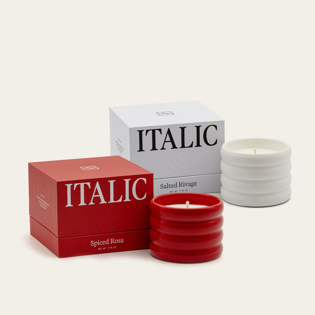 Two soy wax ceramic candles in white containers, crafted by Italic, displayed together for a cozy home ambiance.